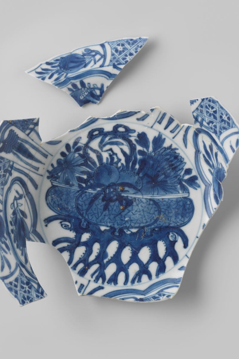 Fragmented blue-and-white porcelain plate recovered from the Dutch East Indiaman Witte Leeuw, wrecked in 1613.